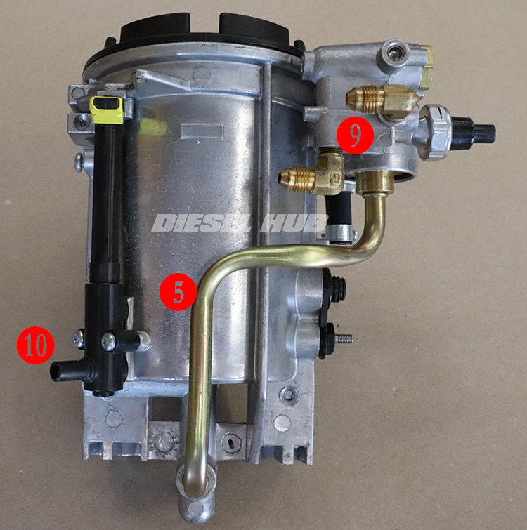 Fuel filter housing drain valve and pressure regulator