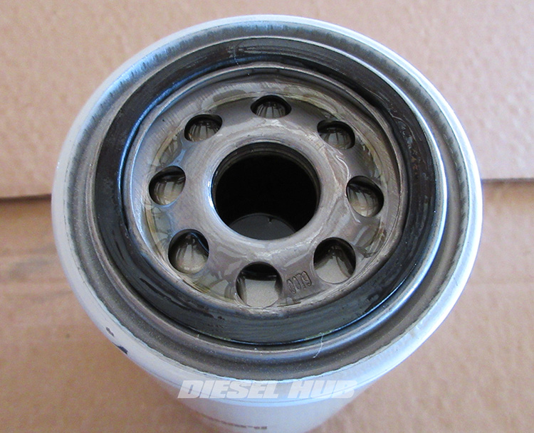 engine oil filter that has been filled with engine oil