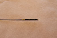 checking oil level on dipstick