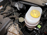 removing fuel filter from housing