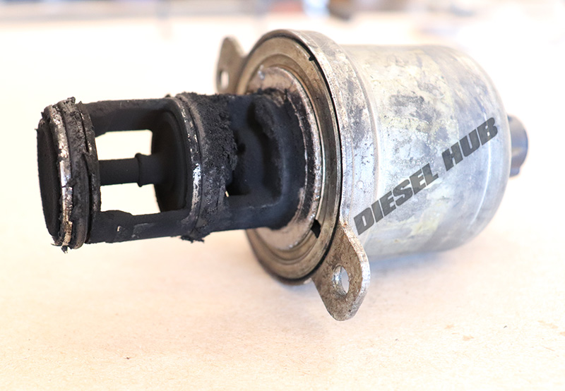 dirty EGR valve removed from a 6.0 power stroke engine