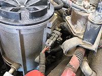Fuel filter housing connector