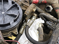 Cylinder head return hoses
