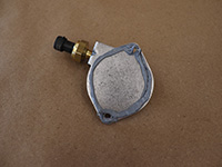 RTV sealant applied to cover