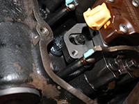 injector hold down bracket