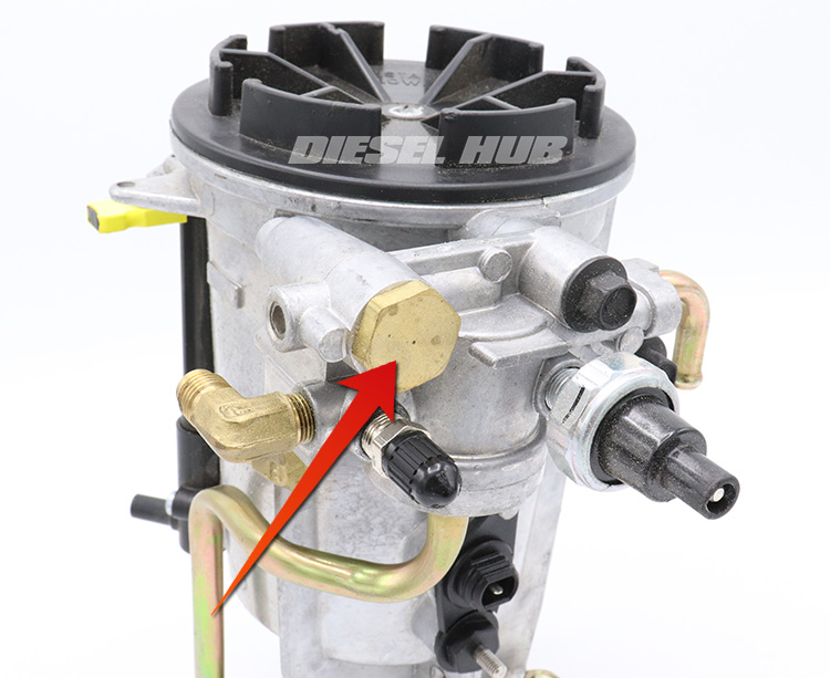 fuel pressure regulator cap on a 1994 to 1997 Power Stroke engine