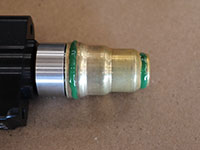 applying retaining compound to the new sleeve