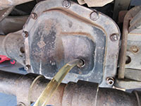 Adding gear oil through differential cover fill plug