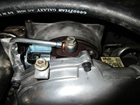 Oil feed line reinstalled on turbocharger