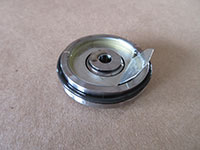 Installing thrust bearing in oil cap