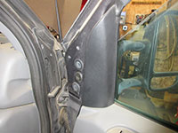 Removing mirror trim piece