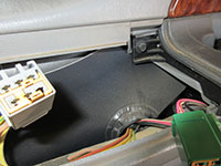 Removing top door panel bolt